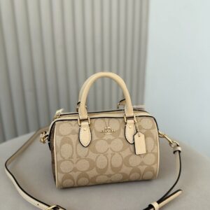Coach Mini Rowan Bag Charm In Signature Canvas Signature Canvas-Gold-Tan-Brown